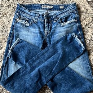 Distressed Blue Jeans